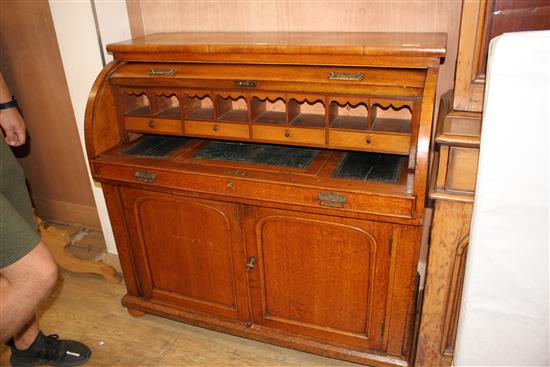 A late Victorian oak cylinder bureau, W.120cm D.56cm H.112cm